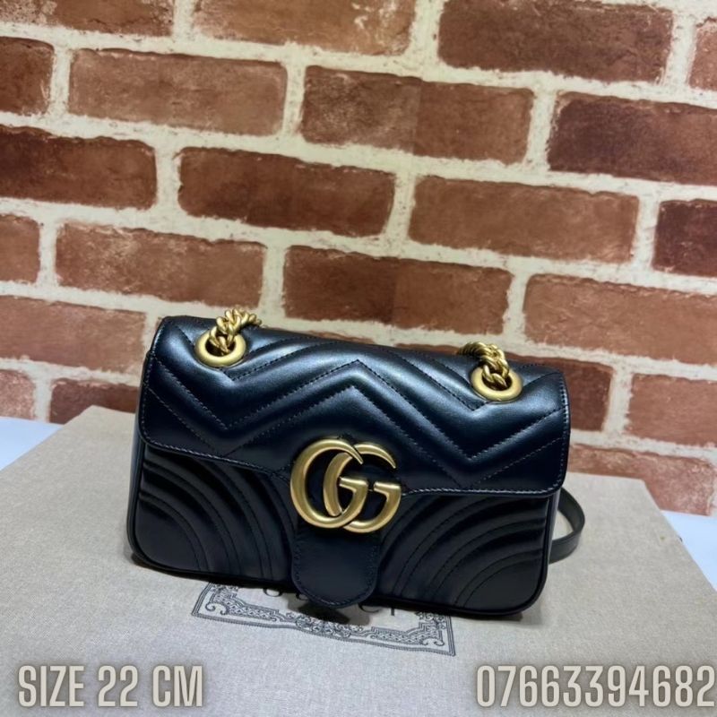 Tui nu Gucci da tron vien chi mau den khoa logo mau vang TNGC08 2