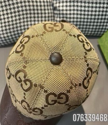 Mu nu Gucci luoi trai dap logo mau nau MNGC14 4