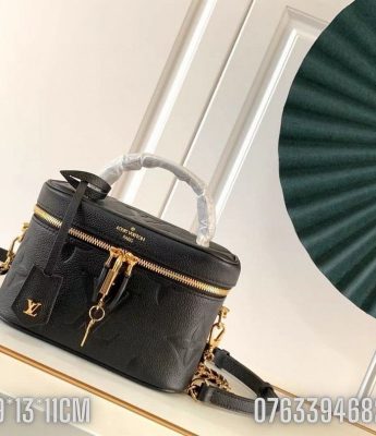 Tui nu Louis Vuitton Vanity Giant hoa chim mau den 1