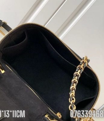 Tui nu Louis Vuitton Vanity Giant hoa chim mau den 2