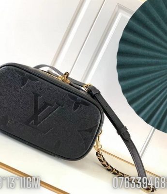 Tui nu Louis Vuitton Vanity Giant hoa chim mau den 4