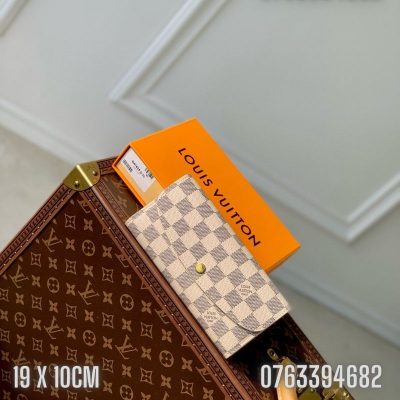 Vi nu Louis Vuitton dang dai caro trang TNLV20 9